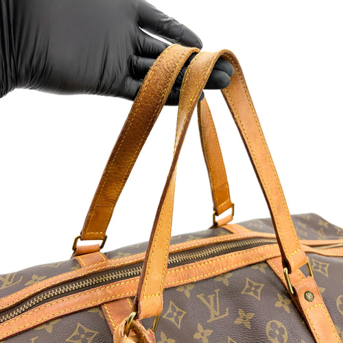 Louis Vuitton - Sac Souple 55